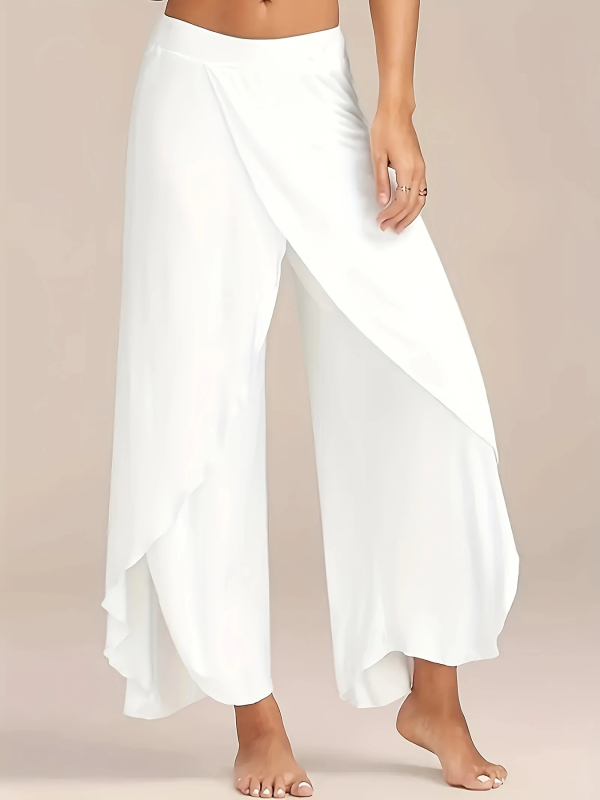 Moteriškos laisvos platėjančios kelnės su skeltu apatine, poliesteris, pagrindinis sudėtinių 30–50% poliesterio, juosmuo vidutinio aukščio, kelnių ilgis – ilgos