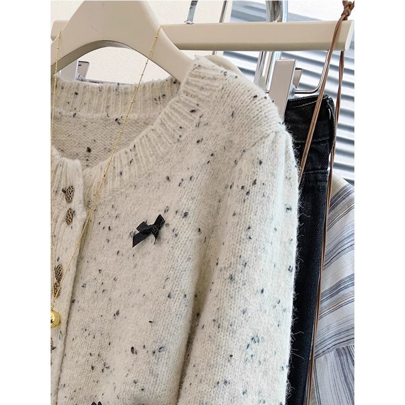 Kardigan od pletenog materijala s mašnicom, akrilna vlakna, dugi rukavi, okrugli izrez, kopčanje na jedan red, gradski stil