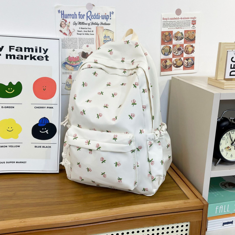 Ученическа раница за момичета с флорален принт (найлон; капацитет 20–35 л; отделение за 12-инчов лаптоп; презрамки с въздушна възглавница; флорален дизайн)