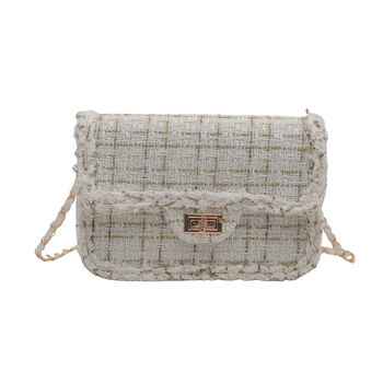 Crossbody torba s urbanim minimalističkim stilom, poseban materijal, kvadratni oblik, zaključavanje, poliester podstava.