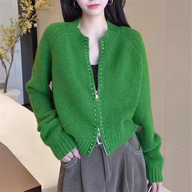 Ženski kardigan sa zipom, kratka dužina, pleteni materijal poliester-akril, opušten kroj, dugi rukavi