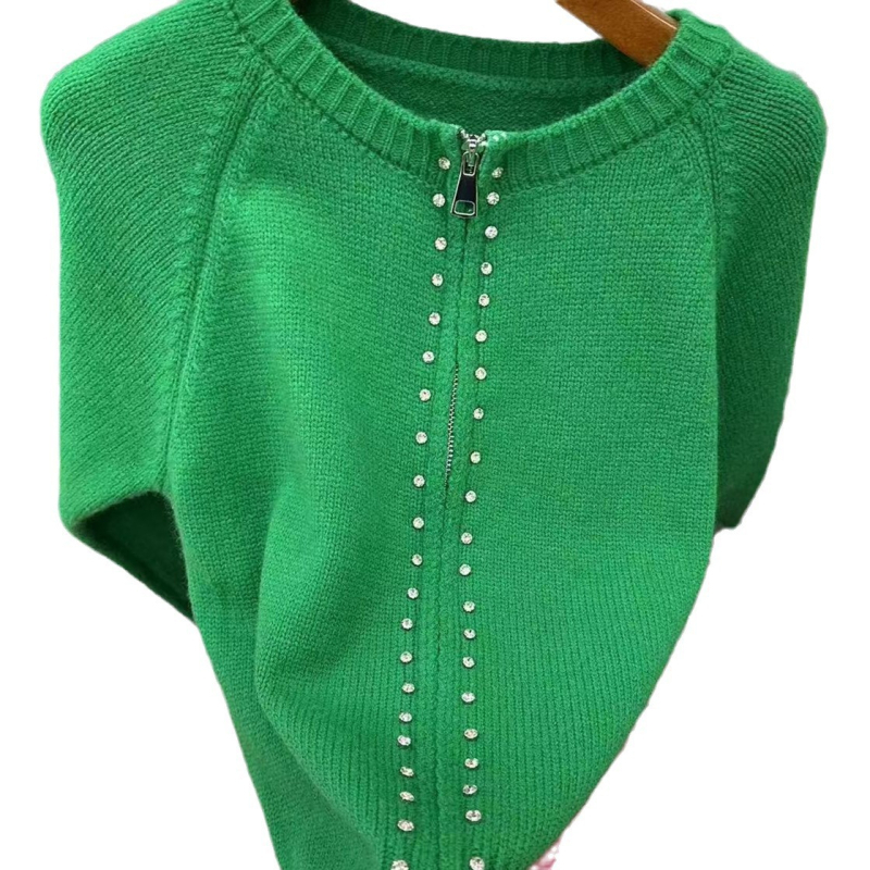 Ženski kardigan sa zipom, kratka dužina, pleteni materijal poliester-akril, opušten kroj, dugi rukavi