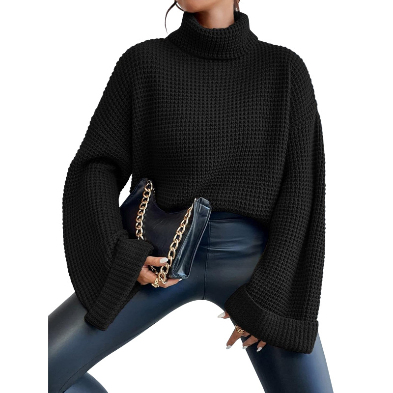 Ženski pleteni džemper s visokim ovratnikom i zvonastim rukavima — 90–95% poliester, dugi rukavi, labav kroj
