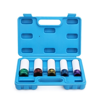 Επεκτεινόμενος προστατευτικός μανσέτας για ελαστικά σε πνευματικό κρουστικό εργαλείο με προστατευτικό κάλυμμα για βίδες ελαστικών