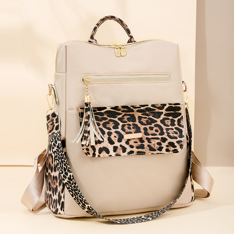 Дамска раница против кражба, ежедневен стил, леопардов принт, голям обем, Oxford плат, закопчаване с цип, вътрешен скрит джоб и джоб за телефон, водоустойчива и износоустойчива