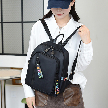 Nylon ruksak s izduženim ramenskim remenom, kompatibilan s 8-inčnim prijenosnim računalom, podstava od poliestera, uzorak s riječima