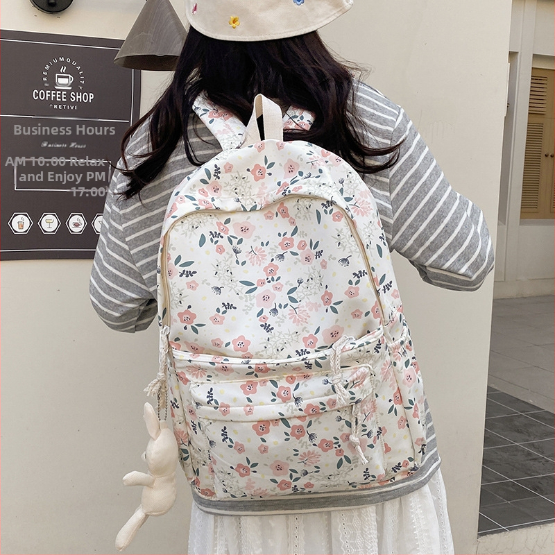 Batoh s kvetinovým vzorom pre každodenné mestské použitie, kapacita do 20 l, z kompozitného materiálu, s oblúkovými ramennými popruhmi