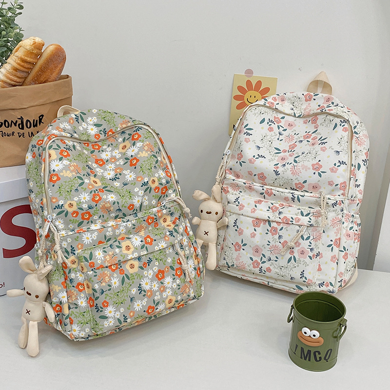 Раница с флорален принт за ежедневна градска употреба, капацитет под 20 л, композитна материя, с извити презрамки