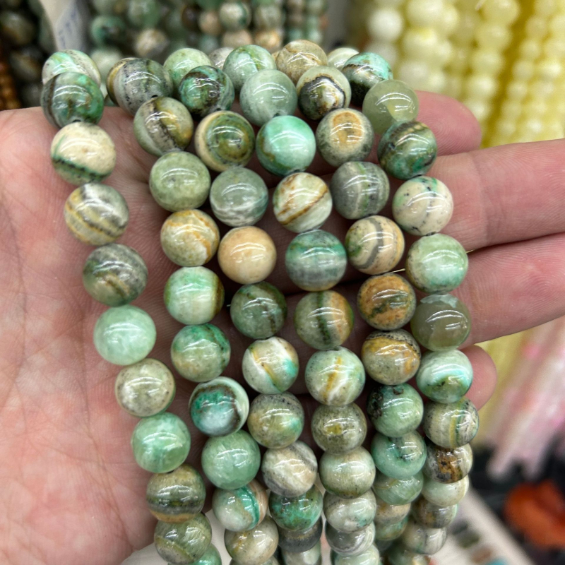 Мъниста за DIY бижута – кръгли каменни мъниста с шарен модел, обработени чрез рязане, шлайфане и полиране