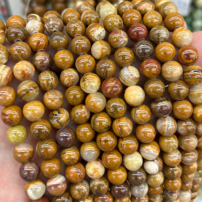 Мъниста за DIY бижута – кръгли каменни мъниста с шарен модел, обработени чрез рязане, шлайфане и полиране