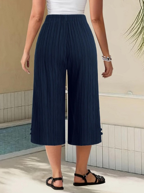 Ženske cropped hlače ravnog kroja od poliestera, s mikroelastičnim pojasom i džepovima