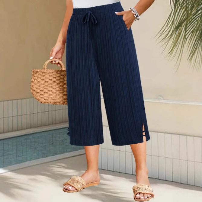 Ženske cropped hlače ravnog kroja od poliestera, s mikroelastičnim pojasom i džepovima