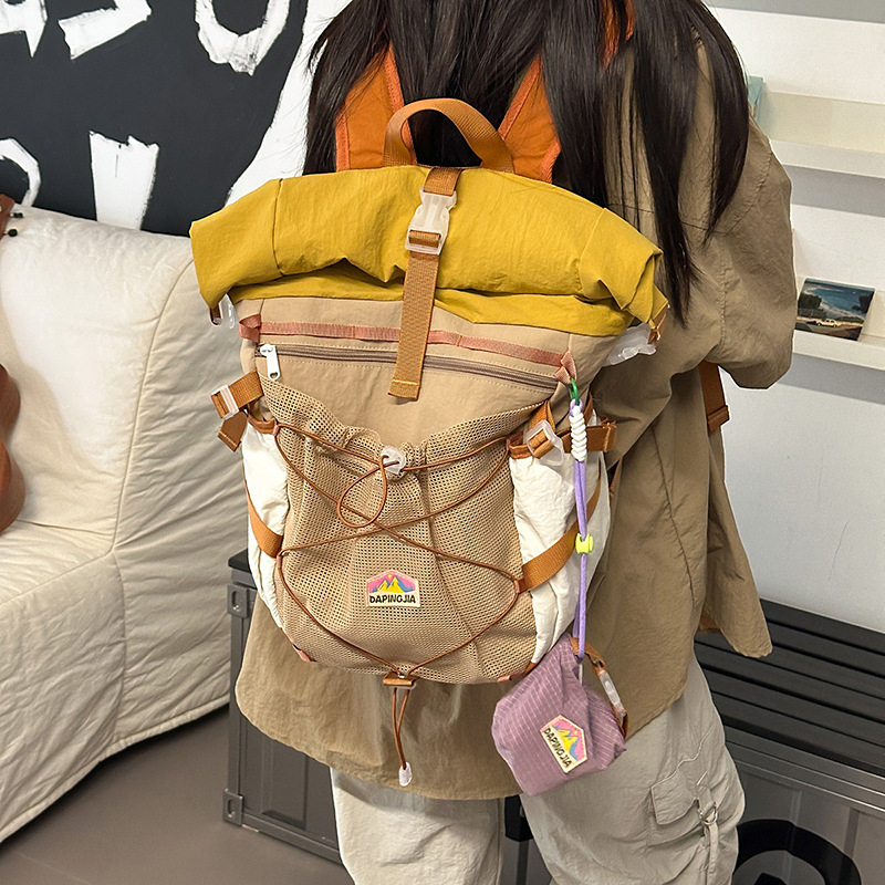 Dámsky nylonový batoh, priedušný dizajn, zakrivené ramenné popruhy, polyesterová podšívka, na školu – leto 2025