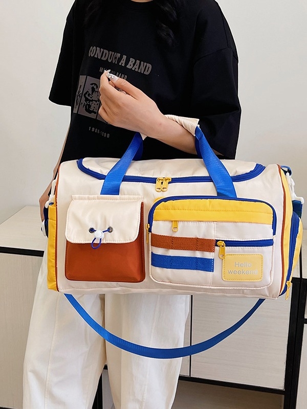 Putna torba s odjeljkom za suho/mokro i odvojenim pretincem za cipele; najlon, kapacitet 20–35 L, zatvaranje na zip.