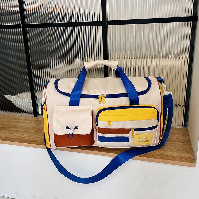 Putna torba s odjeljkom za suho/mokro i odvojenim pretincem za cipele; najlon, kapacitet 20–35 L, zatvaranje na zip.