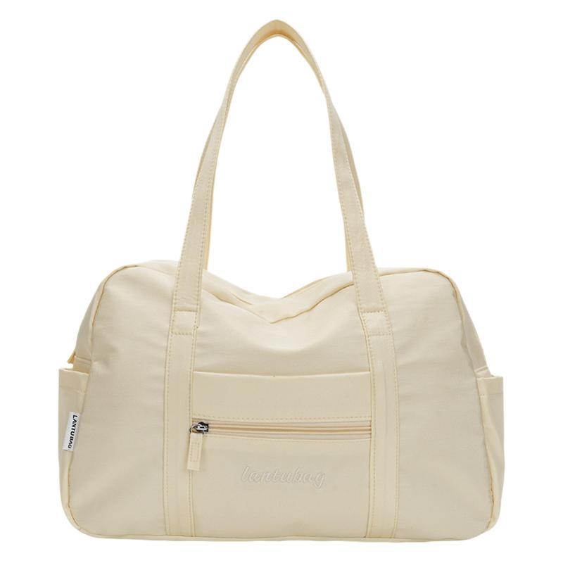 Tote torba u ulicnom stilu, najlon materijal, zatvarač na zip, džep za mobitel