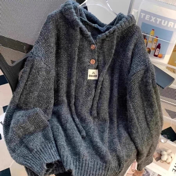 Moteriški storas megztinis su gobtuvu - akrilo audinys, vientisas raštas, laisvas kirpimas, ilgos rankovės (Medžiaga: Akrilas; Storis: Stor; Raštas: Vientisas; Kirpimas: Laisvas; Gobtuvas: Su gobtuvu)