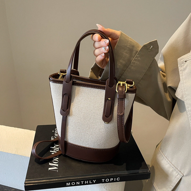 Ženska bucket torba, materijal PU, stil Urban simplicity, podstava od poliester, zatvaranje zatvaračem