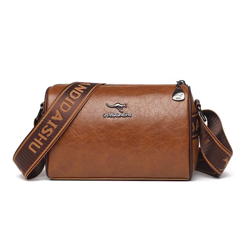 PU materijala crossbody torbica, vodoravni kvadratni oblik, zatvaranje na zip, unutarnji džepovi: džep sa zipom i džep za telefon, trodimenzionalni dizajn