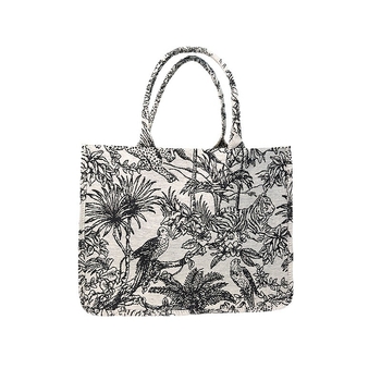 Ženska tote torba s vezom; materijal: pamuk i lan; podstava: poliester; oblik: vertikalni kvadrat; unutarnji džepovi: džep na zip i džep za telefon; naramenice: dvostruke drške