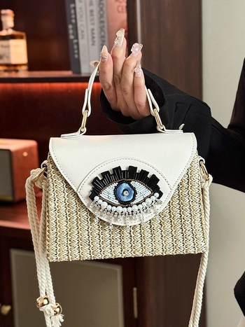 Szalmából készült válltáska – horizontális négyszögletes alak, poliészter bélés, záródás fedett, belső zseb a telefon számára, egyvállú vállpánt