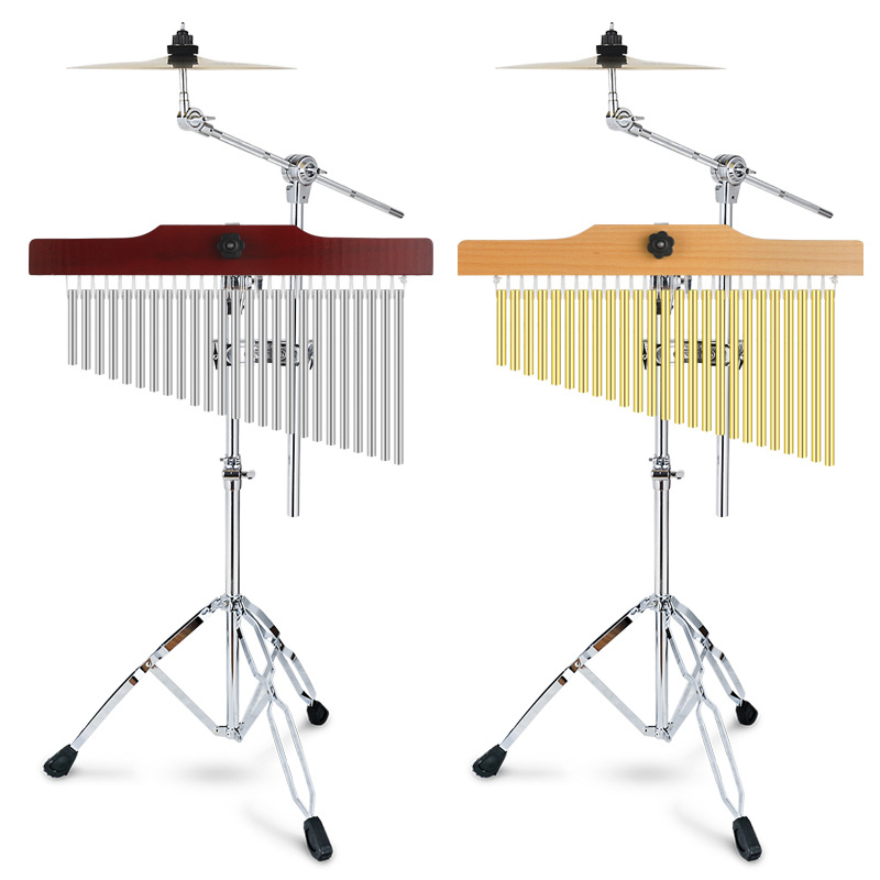 Mediniai vėjo varpeliai rinkinys su 25 tonų ir 36 tonų varpeliais, medinis garso medis su laikikliu ir 20 varpų eilei; vaikams nuo 7 iki 14 metų.