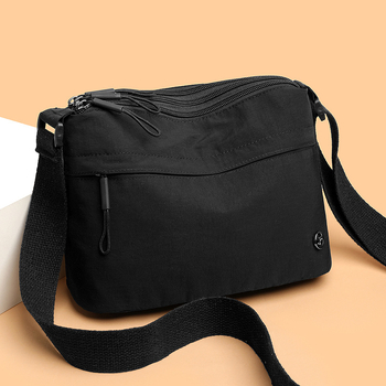Ženska crossbody torba, urbani minimalistički stil, najlon, horizontalni kvadratni oblik, zatvaranje zipom, poliester podstava