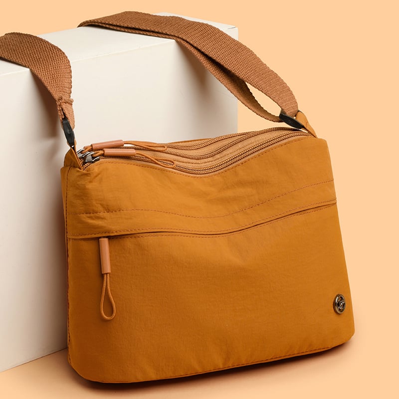 Ženska crossbody torba, urbani minimalistički stil, najlon, horizontalni kvadratni oblik, zatvaranje zipom, poliester podstava