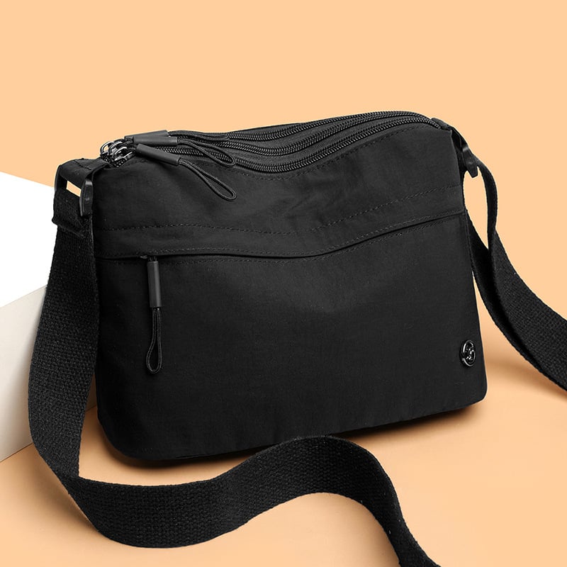 Ženska crossbody torba, urbani minimalistički stil, najlon, horizontalni kvadratni oblik, zatvaranje zipom, poliester podstava