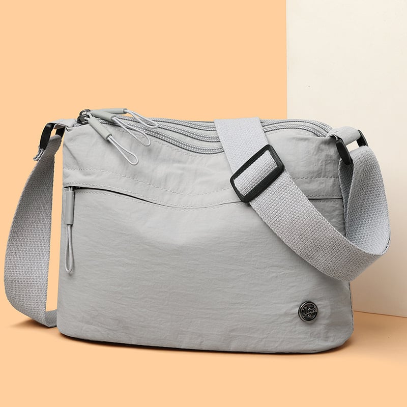 Ženska crossbody torba, urbani minimalistički stil, najlon, horizontalni kvadratni oblik, zatvaranje zipom, poliester podstava