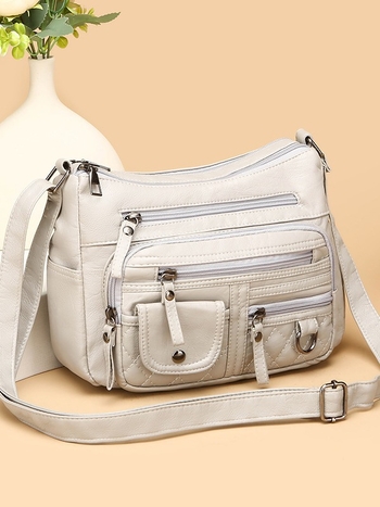 Torba za rame od meke PU kože, mali kvadratni oblik, zatvarač, unutarnji džep sa zipom i džep za telefon, podstava od poliester, jedna naramenica