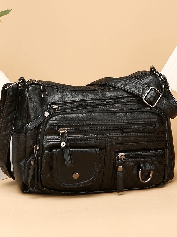 Torba za rame od meke PU kože, mali kvadratni oblik, zatvarač, unutarnji džep sa zipom i džep za telefon, podstava od poliester, jedna naramenica