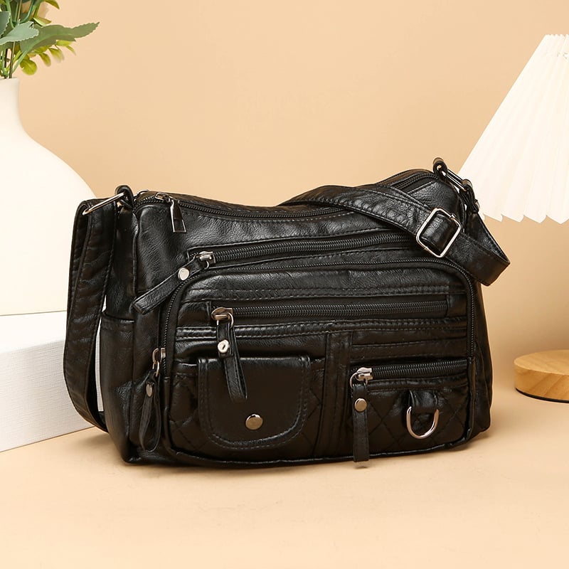 Torba za rame od meke PU kože, mali kvadratni oblik, zatvarač, unutarnji džep sa zipom i džep za telefon, podstava od poliester, jedna naramenica