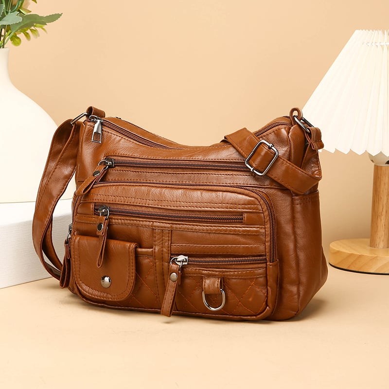 Torba za rame od meke PU kože, mali kvadratni oblik, zatvarač, unutarnji džep sa zipom i džep za telefon, podstava od poliester, jedna naramenica