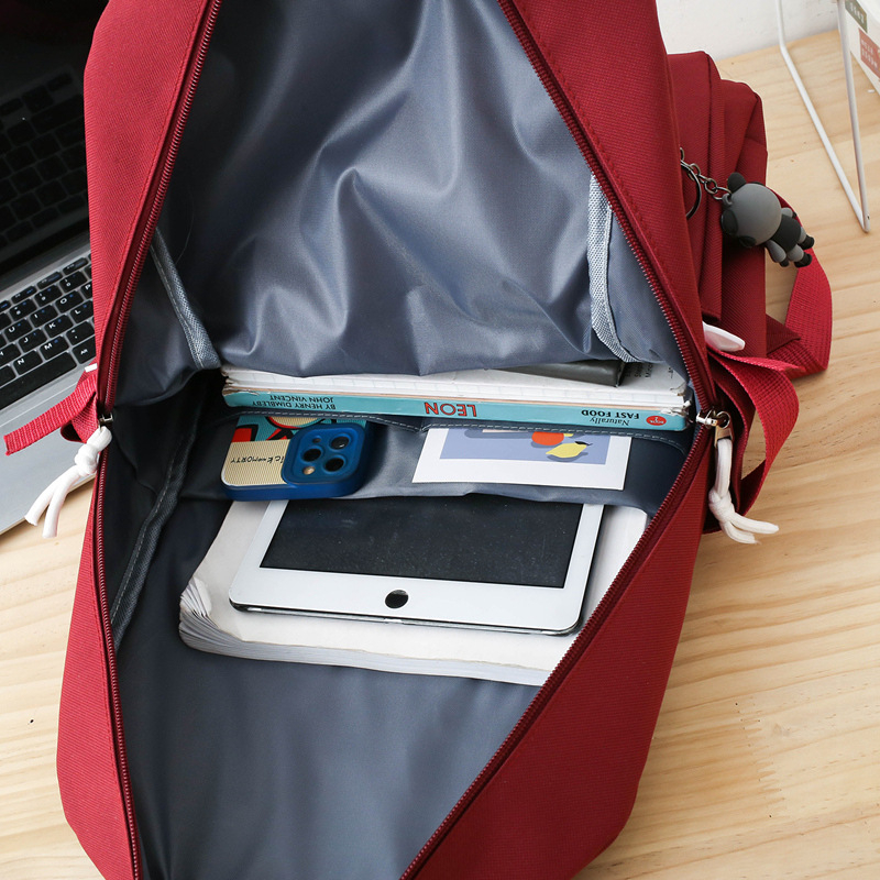 Unisex nylonový batoh s dizajnom v študentskom štýle, veľká kapacita, nepremokavý, zakrivený ramenný popruh, polyesterová podšívka, vzor s písmenami, mestský štýl