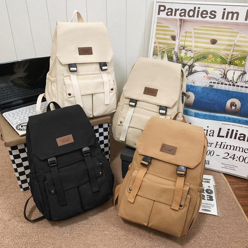 Unisex školski ruksak s preklopnim poklopcem, velika zapremina, nylon materijal, pogodan za rekreacijska putovanja.