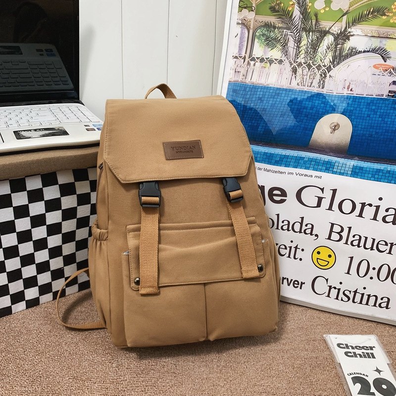 Unisex školski ruksak s preklopnim poklopcem, velika zapremina, nylon materijal, pogodan za rekreacijska putovanja.