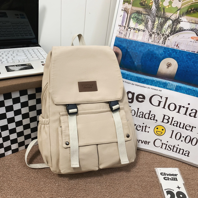 Unisex školski ruksak s preklopnim poklopcem, velika zapremina, nylon materijal, pogodan za rekreacijska putovanja.