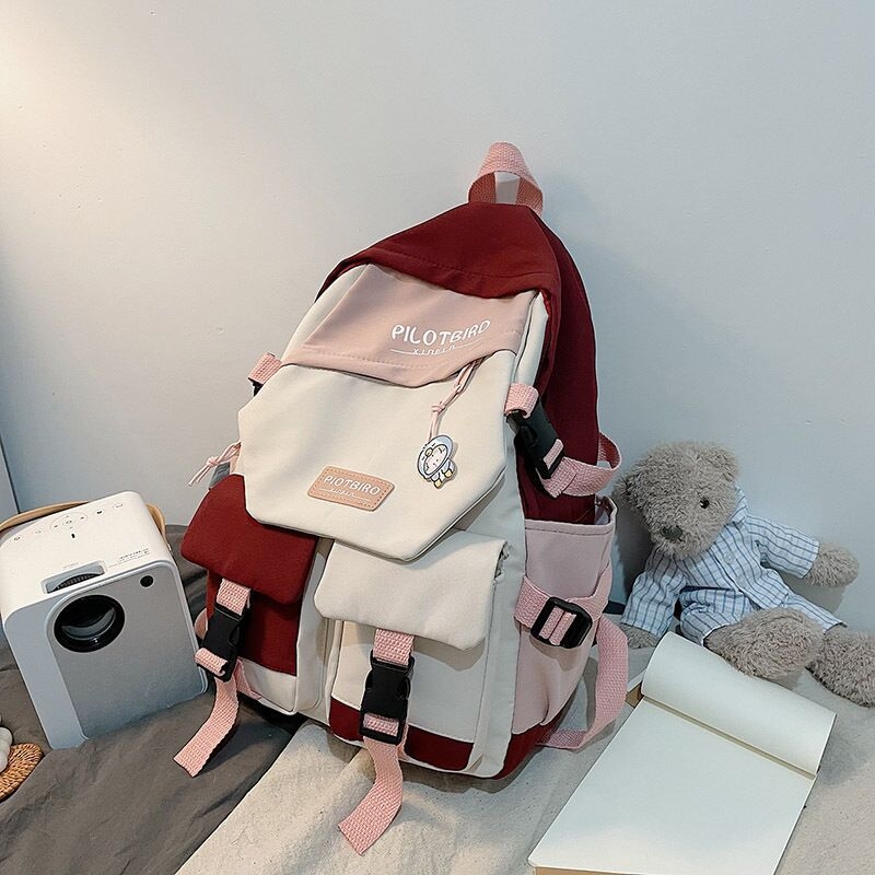 Rucsac cu design cu mai multe buzunare, material nylon, capacitate 20–35 L, închidere cu fermoar, impermeabil și rezistent la uzură.