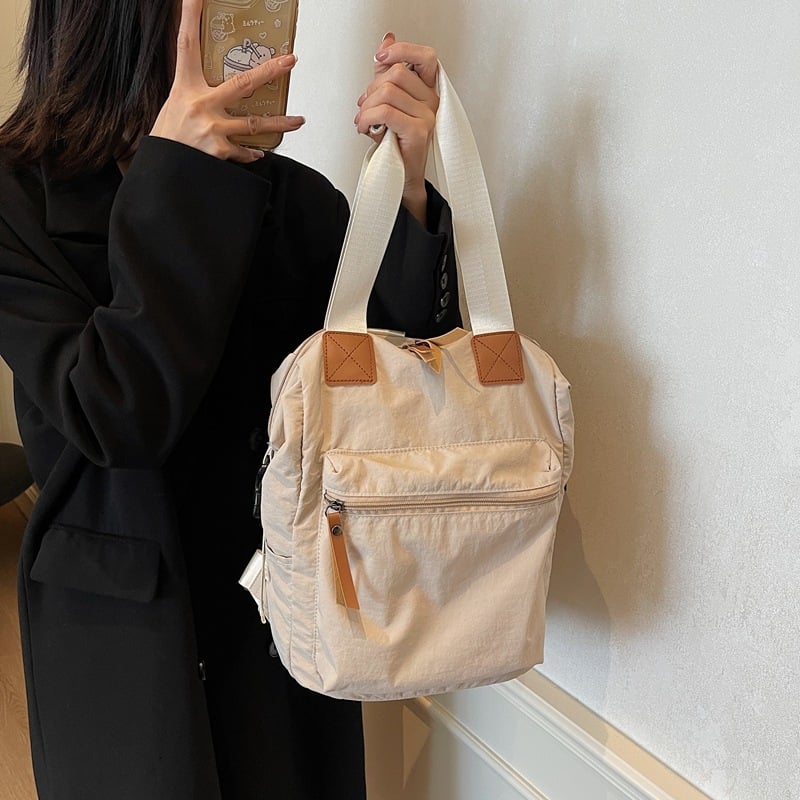 Dumpling torba, Oxford platno, vertikalni četvrtasti oblik, otvaranje na zip, poliester podstava, unutarnja džep sa zipom i ID džep