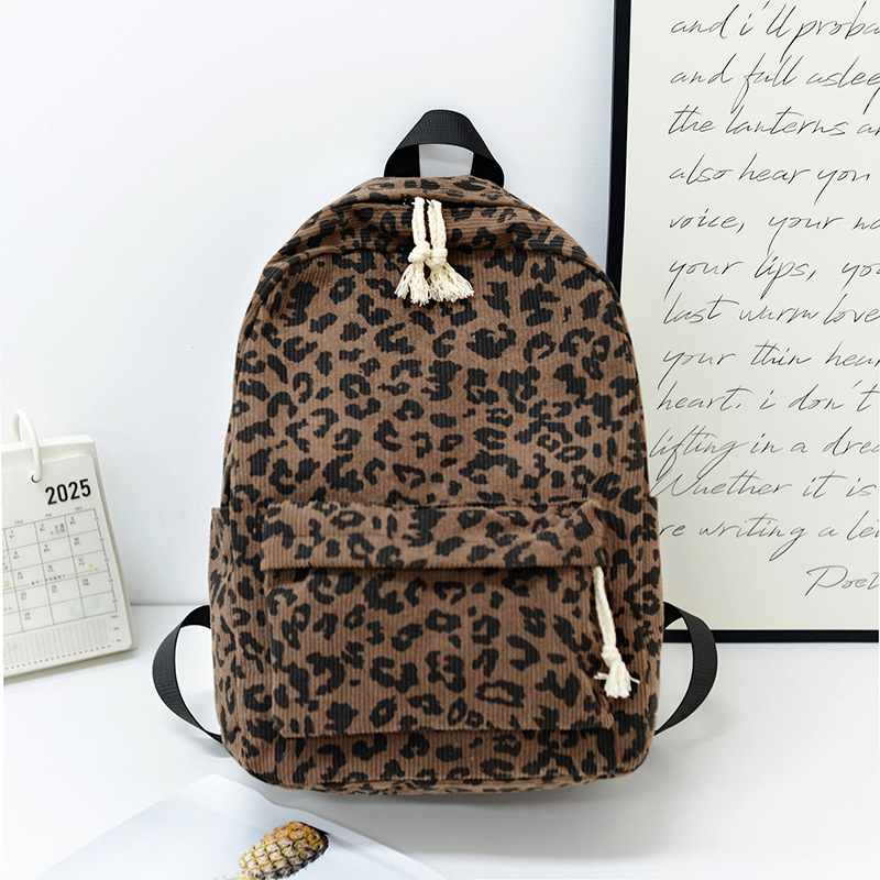 Унисекс раница с леопардов принт, Corduroy материал, 20–35L капацитет, подходяща за 12-инчов лаптоп, извита презрамка