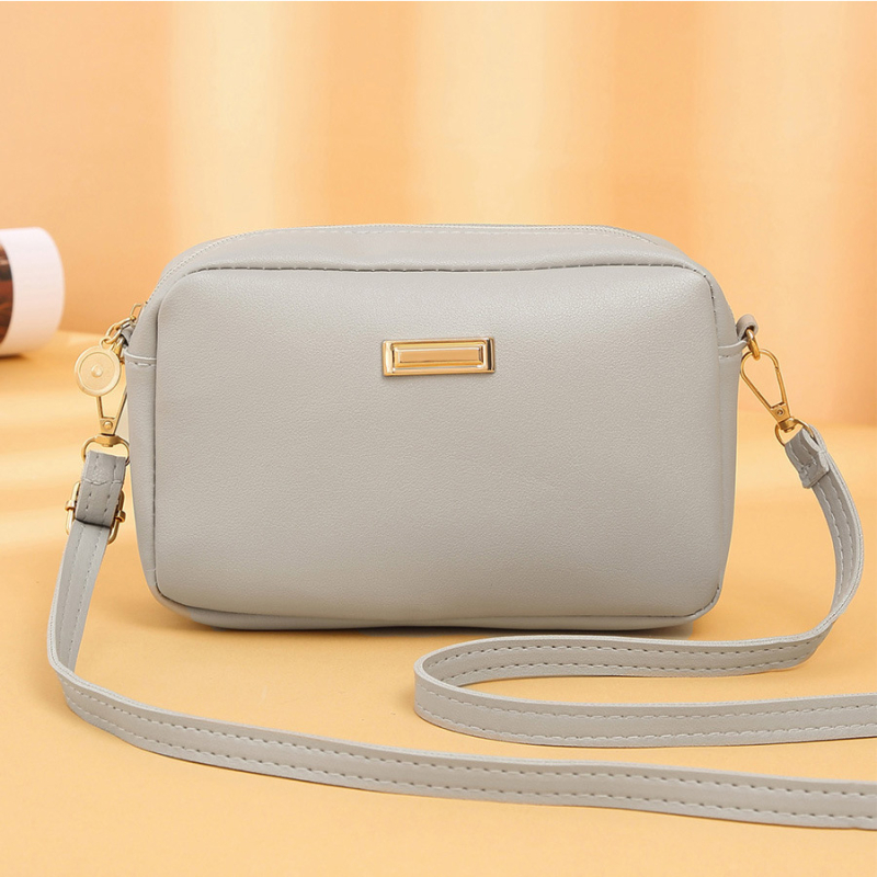 PU crossbody torbica s vodoravnim kvadratnim oblikom, zatvarač, poliester podstava, unutarnji džepovi za telefon i ID karticu