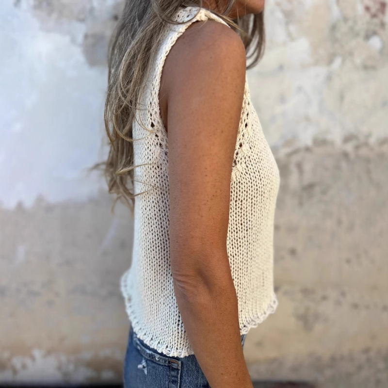 Ženski bezrukavni pleteni kardigan-vest s V izrezom, jedne boje, pamuk-spandeks smjesa, dvije kopče, duljina 50-65 cm, standardni kroj