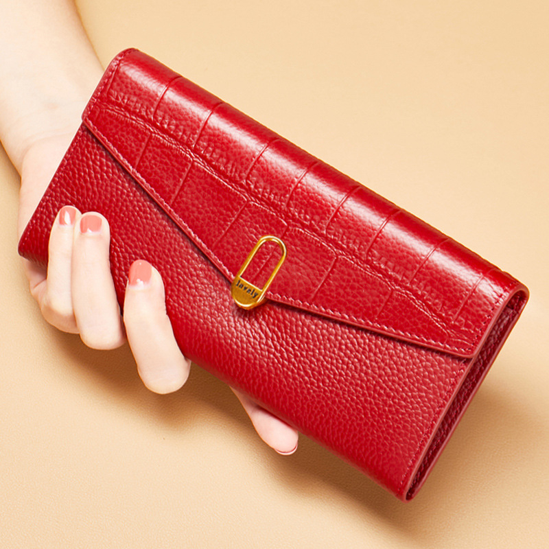 Dlhá dámska peňaženka z pravej hovädzej kože s prackou a viacerými priehradkami na karty | Materiál: Pravá koža; Prvý vrstva hovädzej kože; Podšívka: Polyester; Licencovaná súkromná značka; Uvedenie: leto 2024