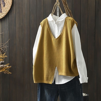 Adīta kokvilnas veste ar neregulāru maliņu, V–izgriezums, brīvs piegriezums, bez piedurknēm