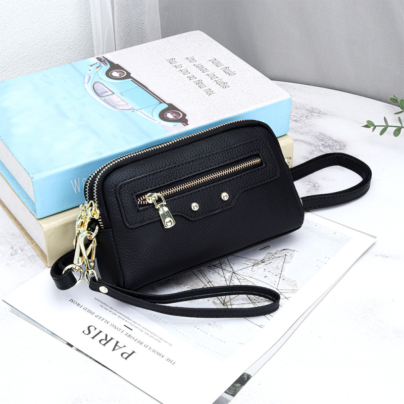 Pravá kožená dámska crossbody kabelka, prvotriedna hovädzia koža, vodorovný štvorcový tvar, zapínanie na zips, vnútorné vrecká: zipsové vrecko, vrecko na telefón, vrecko na občiansky preukaz — leto 2025
