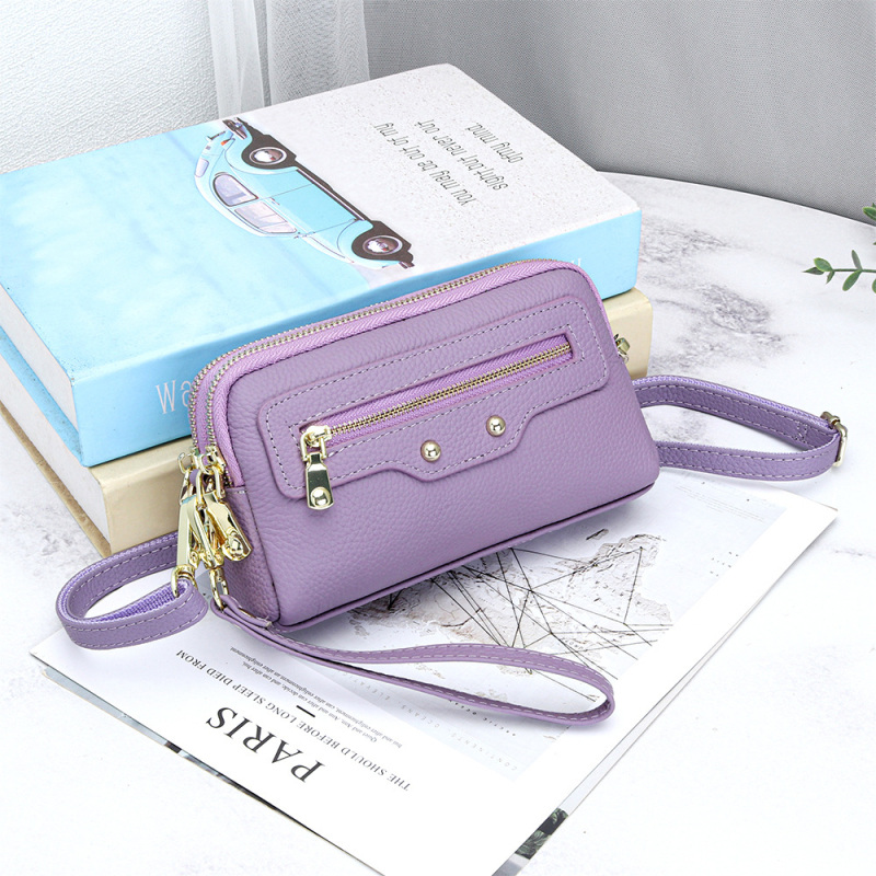 Pravá kožená dámska crossbody kabelka, prvotriedna hovädzia koža, vodorovný štvorcový tvar, zapínanie na zips, vnútorné vrecká: zipsové vrecko, vrecko na telefón, vrecko na občiansky preukaz — leto 2025