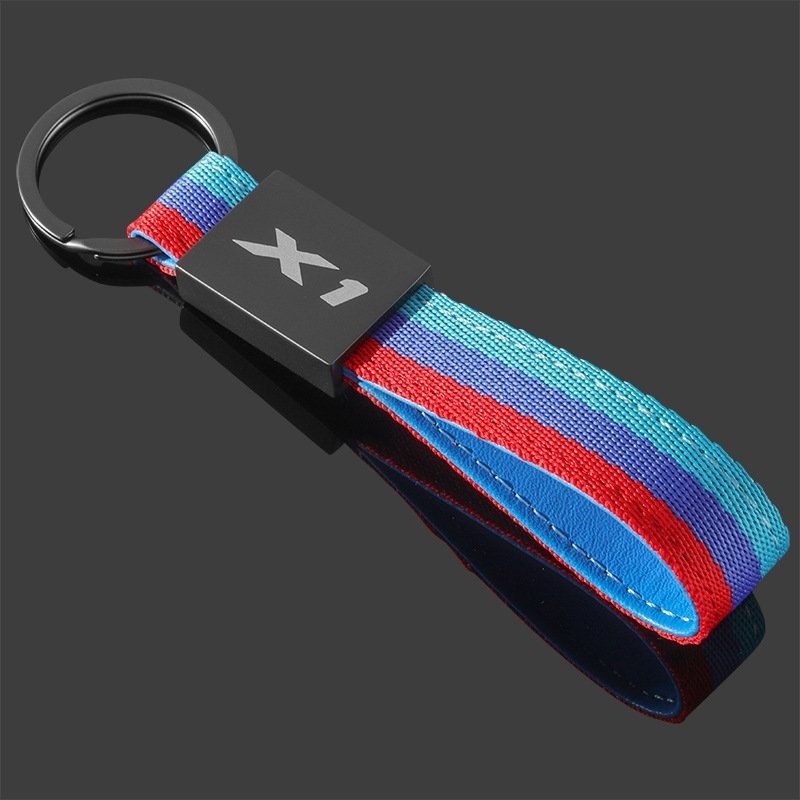 X1 X2 X3 X4 X5 X6 X7 Nylonový opletený kľúčen s logom auta zo zliatiny zinku – Model 577