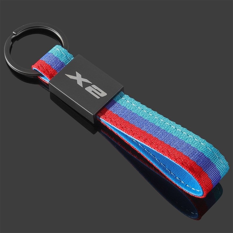 X1 X2 X3 X4 X5 X6 X7 Nylonový opletený kľúčen s logom auta zo zliatiny zinku – Model 577