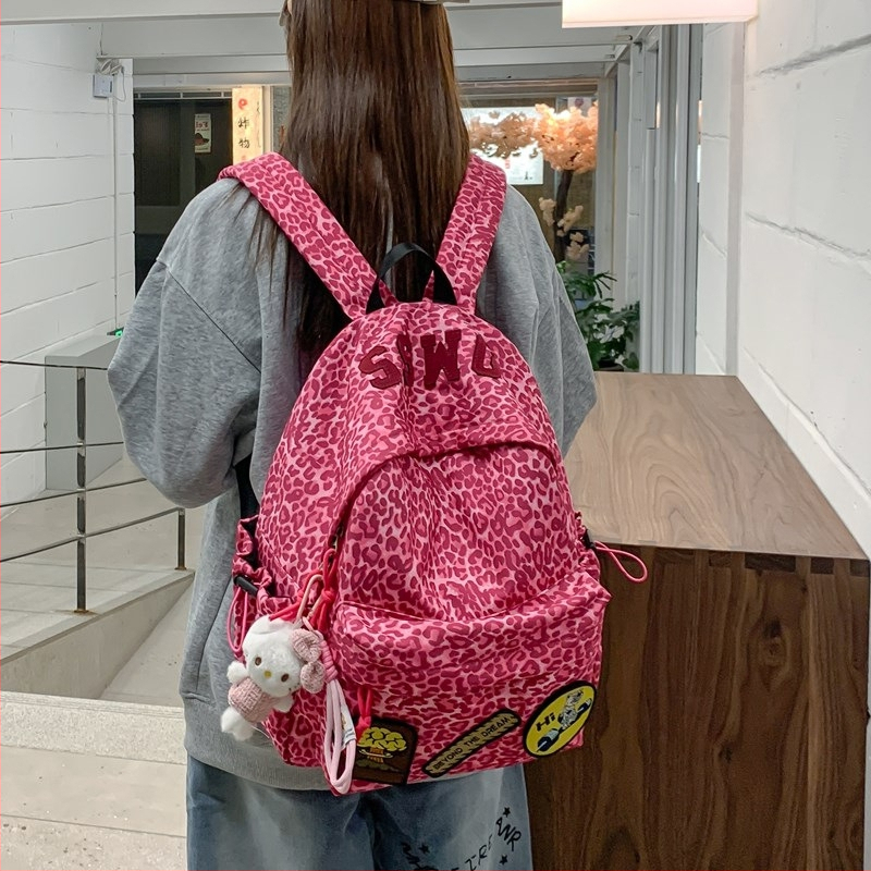 Nylonový batoh s leopardím vzorom, veľká kapacita 36–55 L, kompatibilný s 14-palcovým notebookom, rozšíriteľný, pre unisex každodenné a školské použitie